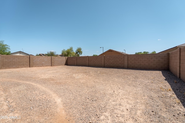 24349 W Gregory Rd, Buckeye, AZ 85326 - view of yard with a fenced backyard