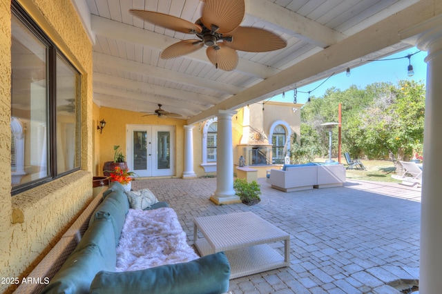 view of patio with french doors and outdoor lounge area