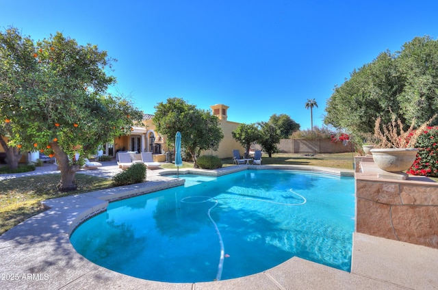 view of swimming pool featuring a patio