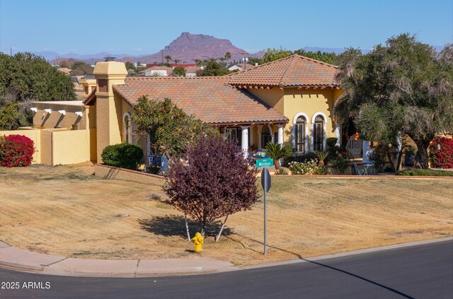 mediterranean / spanish-style house featuring a mountain view