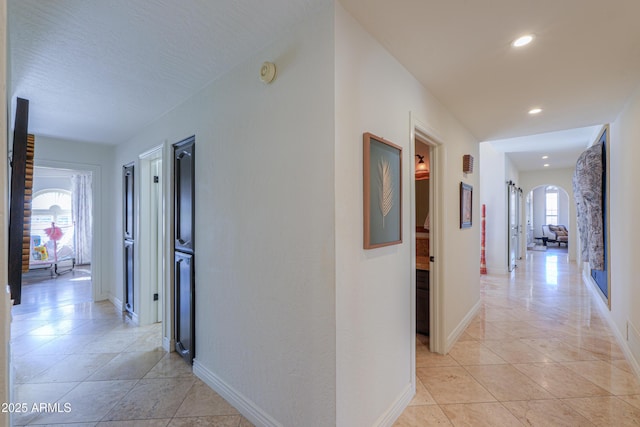 corridor with a wealth of natural light