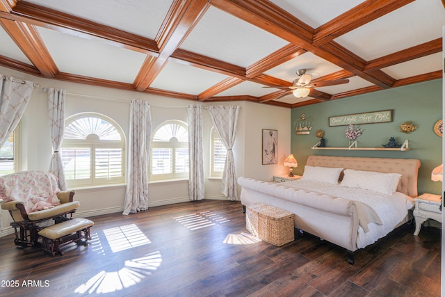 bedroom featuring ceiling fan, hardwood / wood-style floors, beam ceiling, crown molding, and coffered ceiling