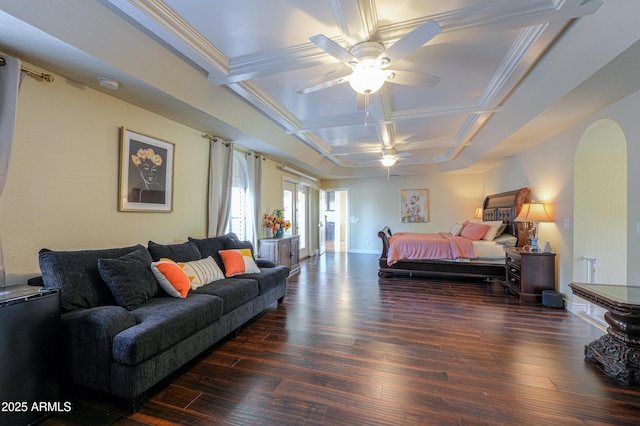 bedroom with dark wood-type flooring, ceiling fan, ornamental molding, and coffered ceiling