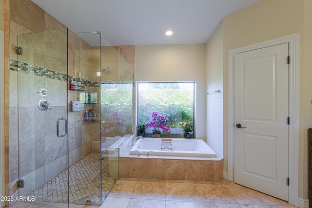 bathroom featuring tile patterned floors and plus walk in shower