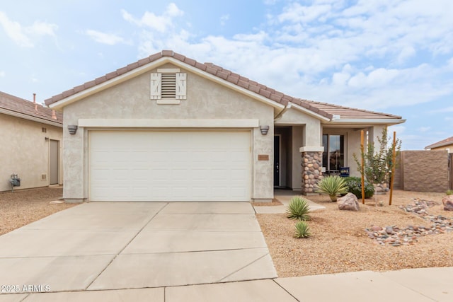 view of front of property featuring a garage