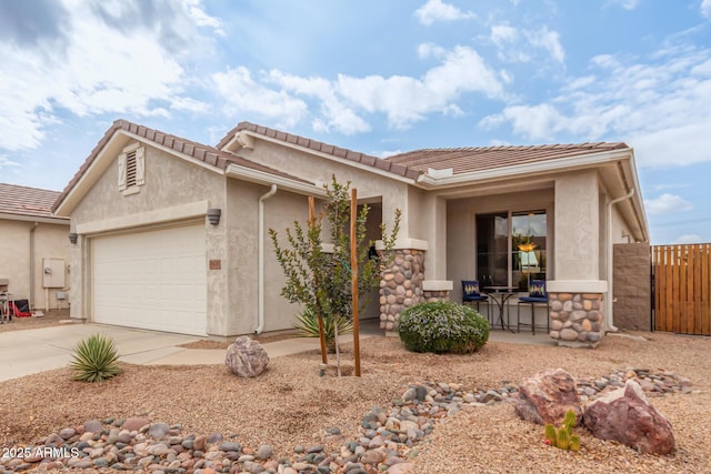 ranch-style house featuring a garage