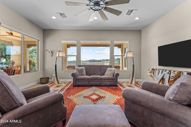 living room featuring ceiling fan