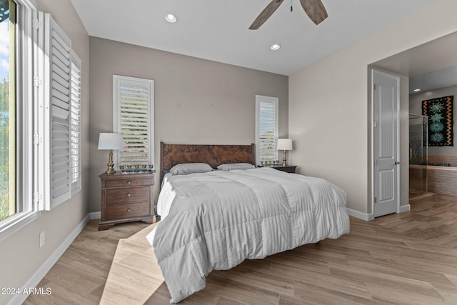 bedroom featuring recessed lighting, baseboards, light wood-style flooring, and ceiling fan