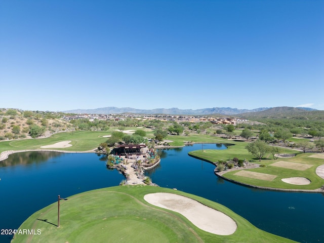 aerial view featuring a water and mountain view and golf course view