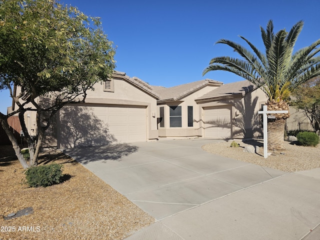 ranch-style home with a garage