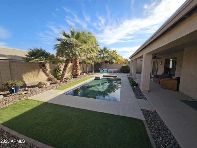 view of swimming pool featuring a patio area