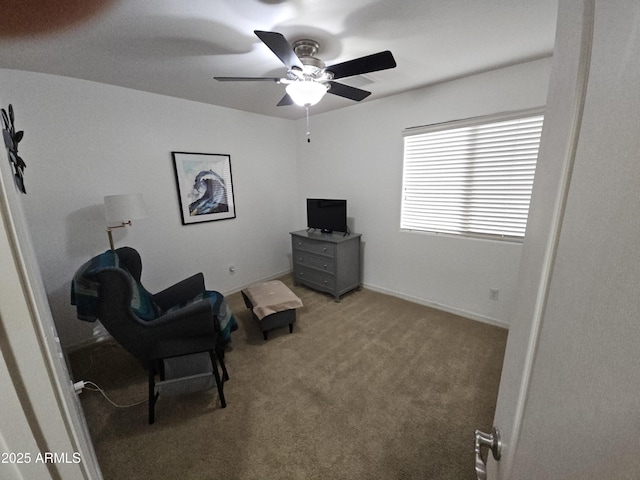 living area with carpet flooring and ceiling fan