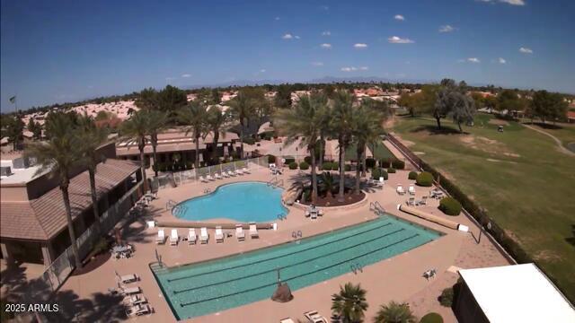 community pool with a patio