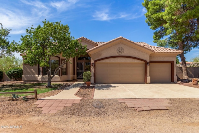 26815 N 79th St, Scottsdale, AZ 85266 - view of front of property featuring a garage, a tiled roof, driveway, and stucco siding