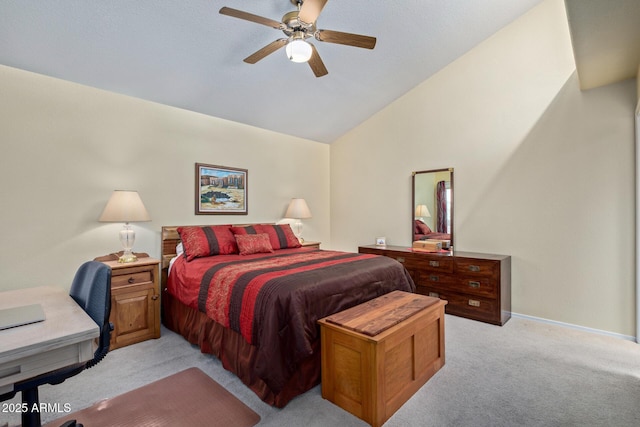 bedroom featuring a ceiling fan, light colored carpet, vaulted ceiling, and baseboards