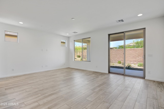4515 Charro Ct, Wickenburg, AZ 85390 - unfurnished room with light wood-style floors, recessed lighting, plenty of natural light, and baseboards