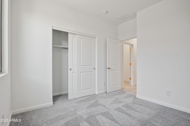 4515 Charro Ct, Wickenburg, AZ 85390 - unfurnished bedroom with carpet flooring, a closet, and baseboards