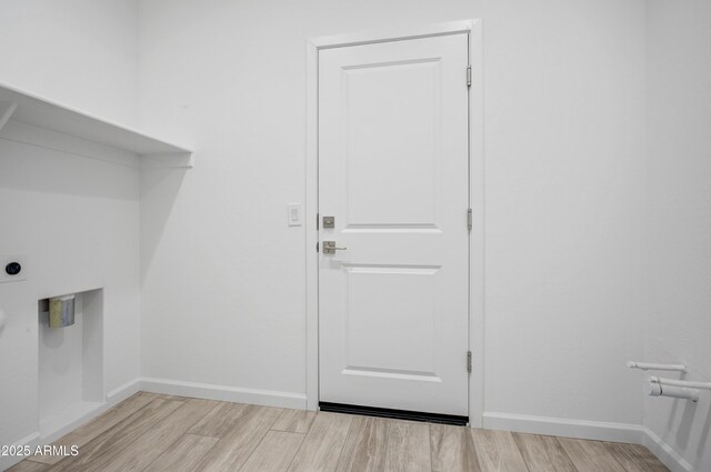 4515 Charro Ct, Wickenburg, AZ 85390 - laundry room featuring wood finished floors, baseboards, and electric dryer hookup