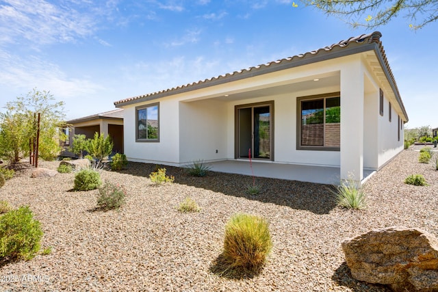 4515 Charro Ct, Wickenburg, AZ 85390 - rear view of house featuring a patio and stucco siding