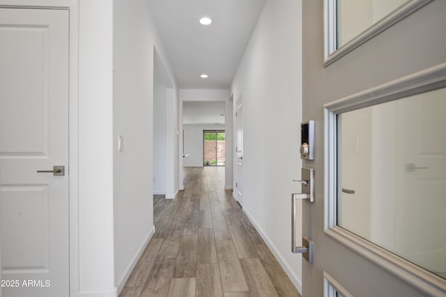 4515 Charro Ct, Wickenburg, AZ 85390 - hallway with baseboards, light wood finished floors, and recessed lighting