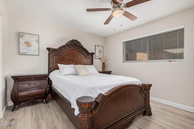 5808 E Lawndale St, Mesa, AZ 85215 - bedroom featuring wood finished floors, baseboards, and a ceiling fan