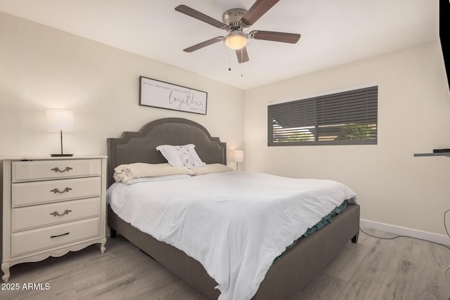 5808 E Lawndale St, Mesa, AZ 85215 - bedroom featuring light wood finished floors, baseboards, and ceiling fan