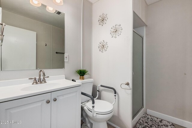5808 E Lawndale St, Mesa, AZ 85215 - full bath with toilet, a stall shower, vanity, and baseboards