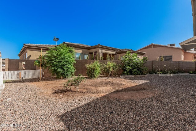 5808 E Lawndale St, Mesa, AZ 85215 - back of property with stucco siding and a tiled roof
