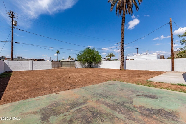 view of yard featuring a patio and a fenced backyard