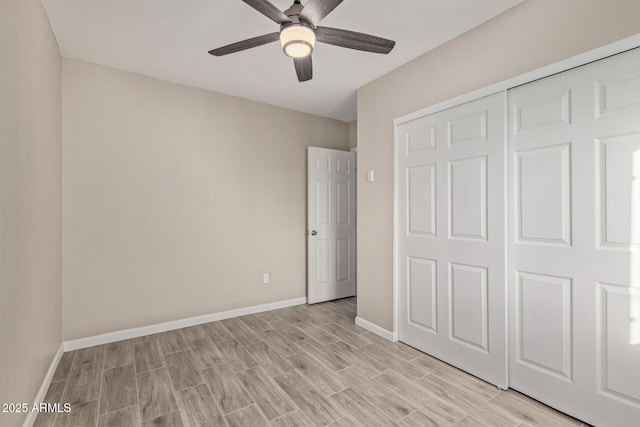 unfurnished bedroom featuring a closet, ceiling fan, and light wood-type flooring