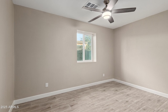 unfurnished room with ceiling fan and light hardwood / wood-style flooring