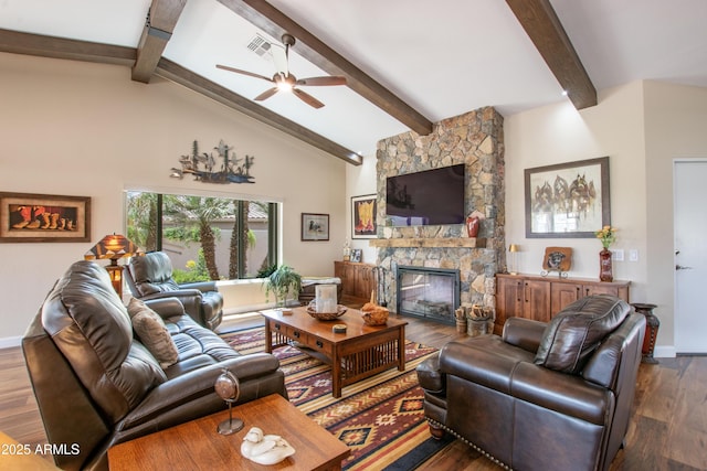 3441 N 162nd Ln, Goodyear, AZ 85395 - living area featuring wood finished floors, ceiling fan, a fireplace, and baseboards