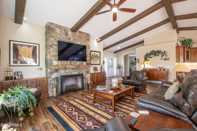 3441 N 162nd Ln, Goodyear, AZ 85395 - living area featuring ceiling fan, a stone fireplace, and wood finished floors