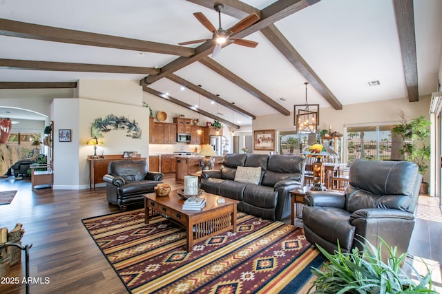 3441 N 162nd Ln, Goodyear, AZ 85395 - living room featuring arched walkways, ceiling fan, dark wood-style floors, baseboards, and a chandelier