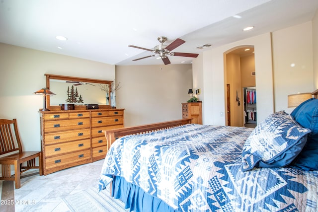 3441 N 162nd Ln, Goodyear, AZ 85395 - bedroom featuring arched walkways, recessed lighting, and ceiling fan