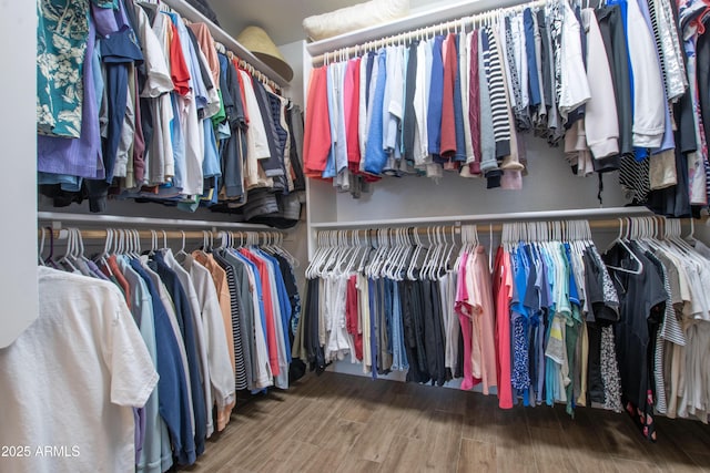 3441 N 162nd Ln, Goodyear, AZ 85395 - walk in closet featuring wood finished floors
