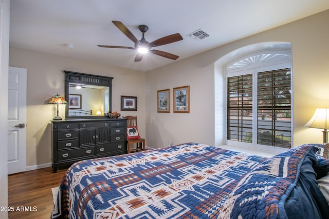 3441 N 162nd Ln, Goodyear, AZ 85395 - bedroom with wood finished floors, ceiling fan, and baseboards