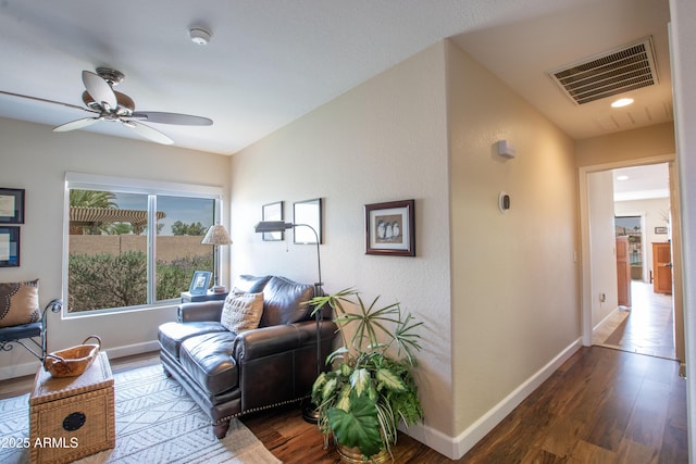 3441 N 162nd Ln, Goodyear, AZ 85395 - living area with wood finished floors, baseboards, and ceiling fan