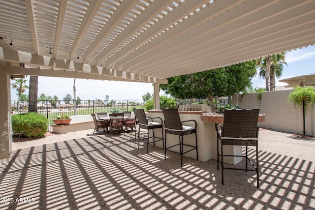 3441 N 162nd Ln, Goodyear, AZ 85395 - fenced backyard featuring a patio and a pergola