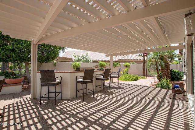 3441 N 162nd Ln, Goodyear, AZ 85395 - fenced backyard featuring a pergola and a patio area