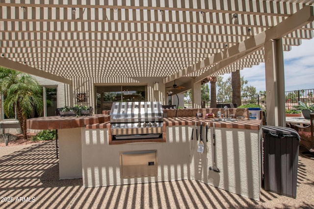 3441 N 162nd Ln, Goodyear, AZ 85395 - view of patio featuring area for grilling, a pergola, and a ceiling fan