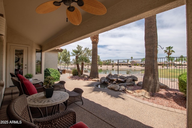 3441 N 162nd Ln, Goodyear, AZ 85395 - view of patio / terrace featuring ceiling fan and a water view