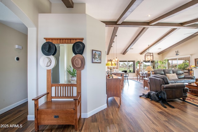 3441 N 162nd Ln, Goodyear, AZ 85395 - living area featuring wood finished floors, baseboards, and arched walkways