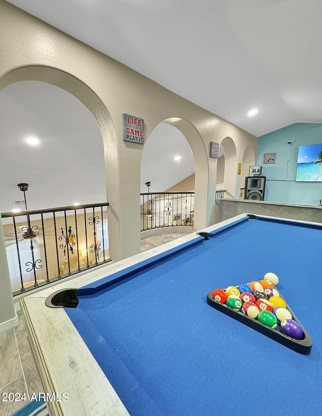 rec room featuring vaulted ceiling and pool table