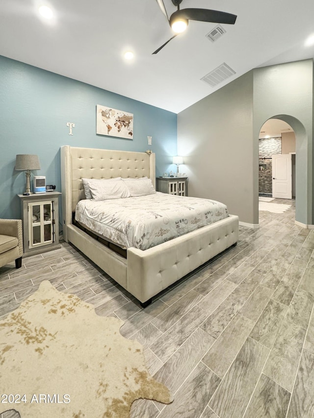 bedroom featuring hardwood / wood-style floors and ceiling fan