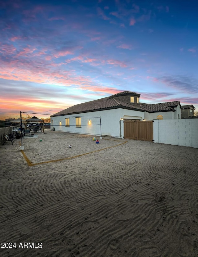 view of property exterior at dusk