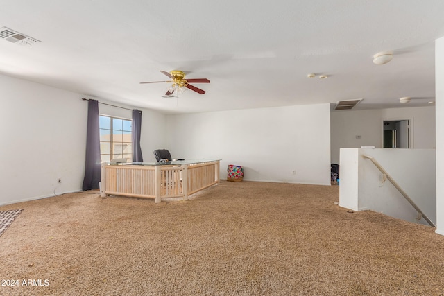 interior space featuring ceiling fan