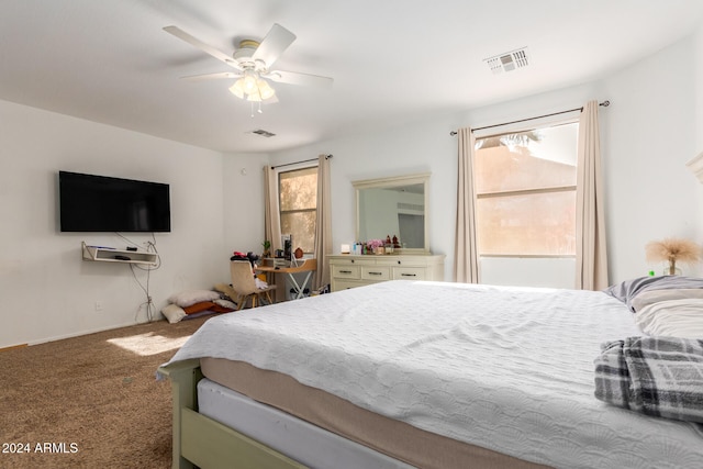 bedroom with ceiling fan and carpet