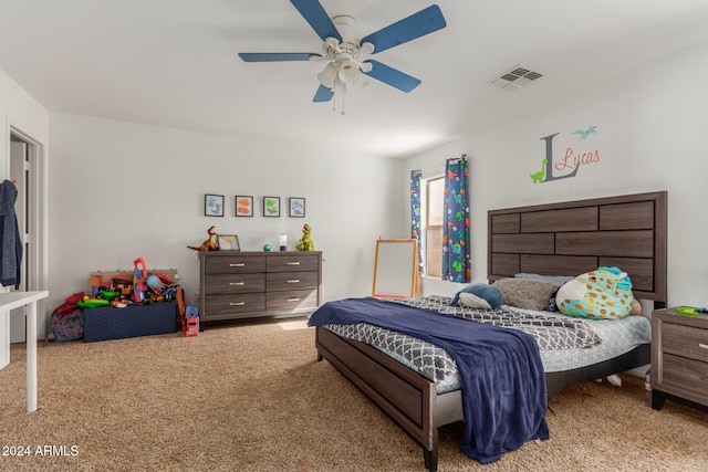 carpeted bedroom featuring ceiling fan