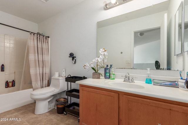 full bathroom with toilet, shower / bath combo, vanity, and tile patterned flooring